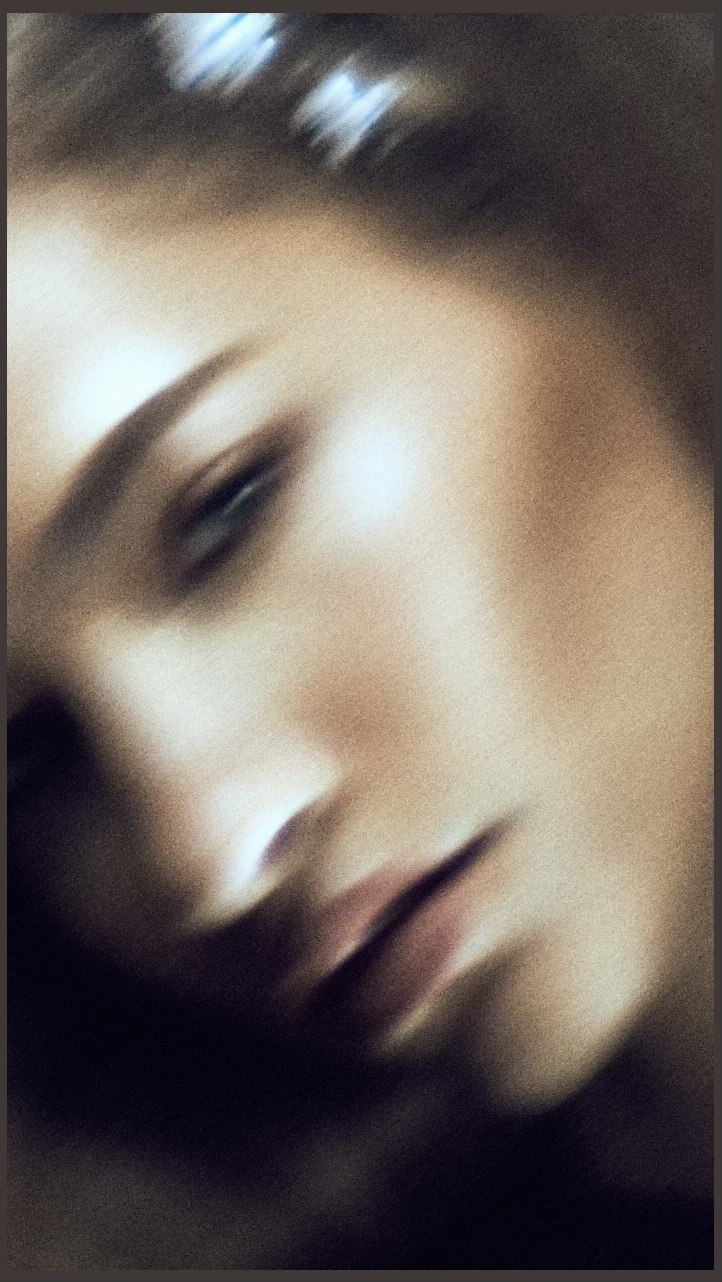 Soft-focus beauty portrait in warm light
