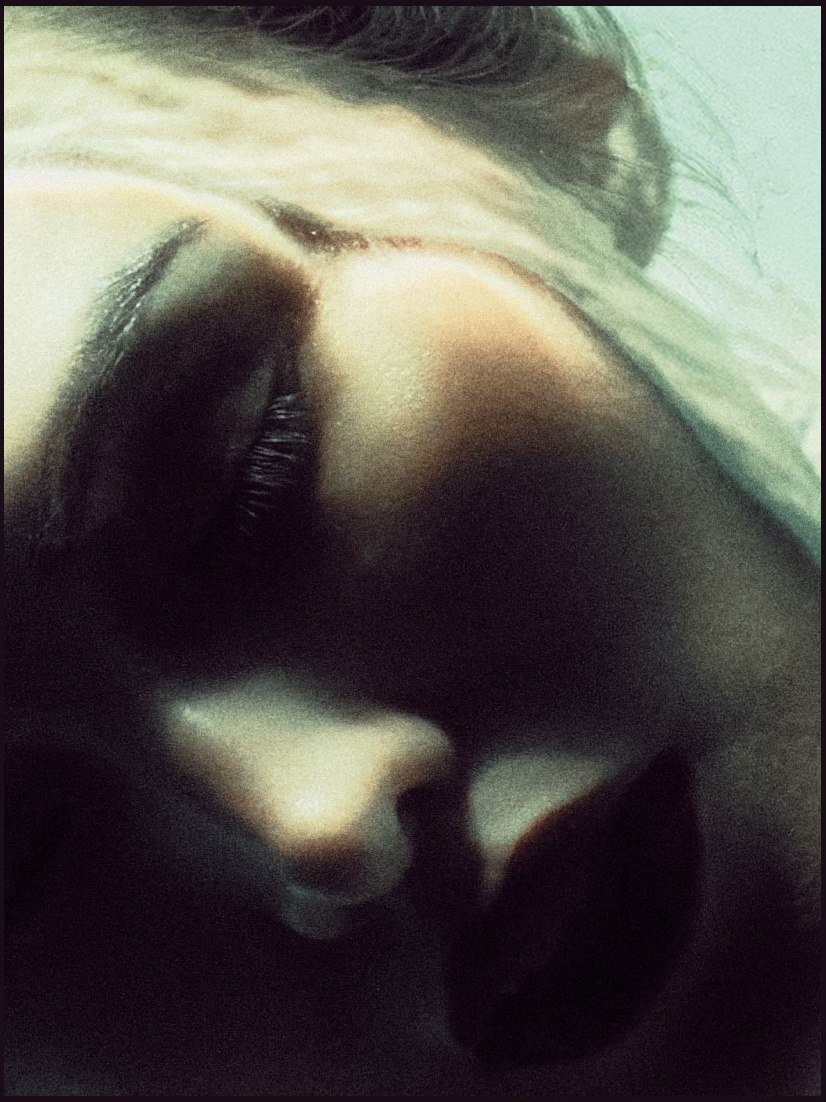 Soft-focus portrait in pale green light