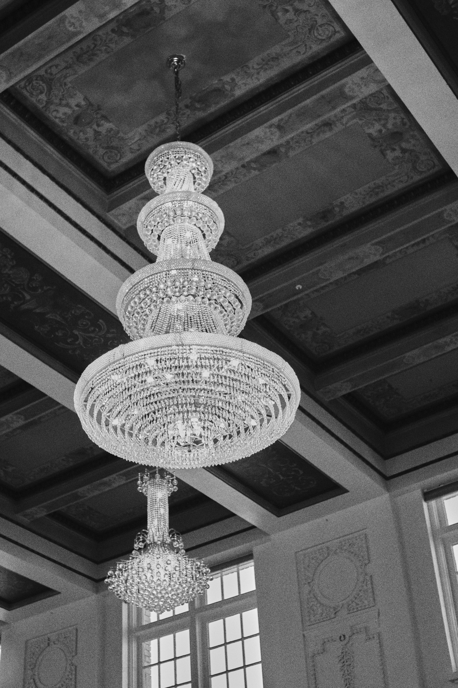 Chandelier and ornate ceiling