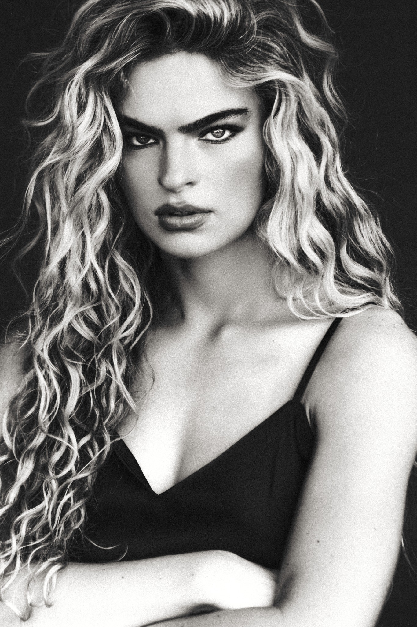 Studio portrait with long textured blonde hair