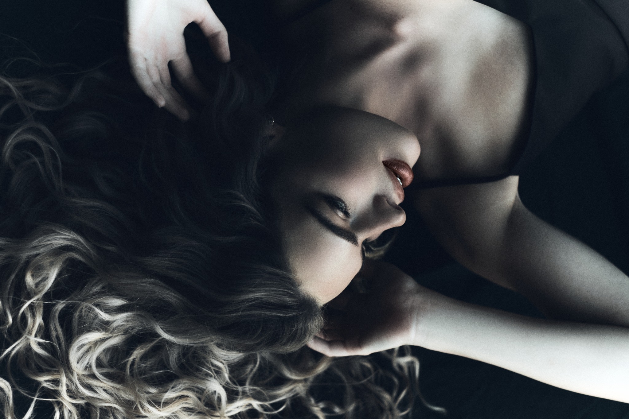 Portrait in shadow with textured blonde hair