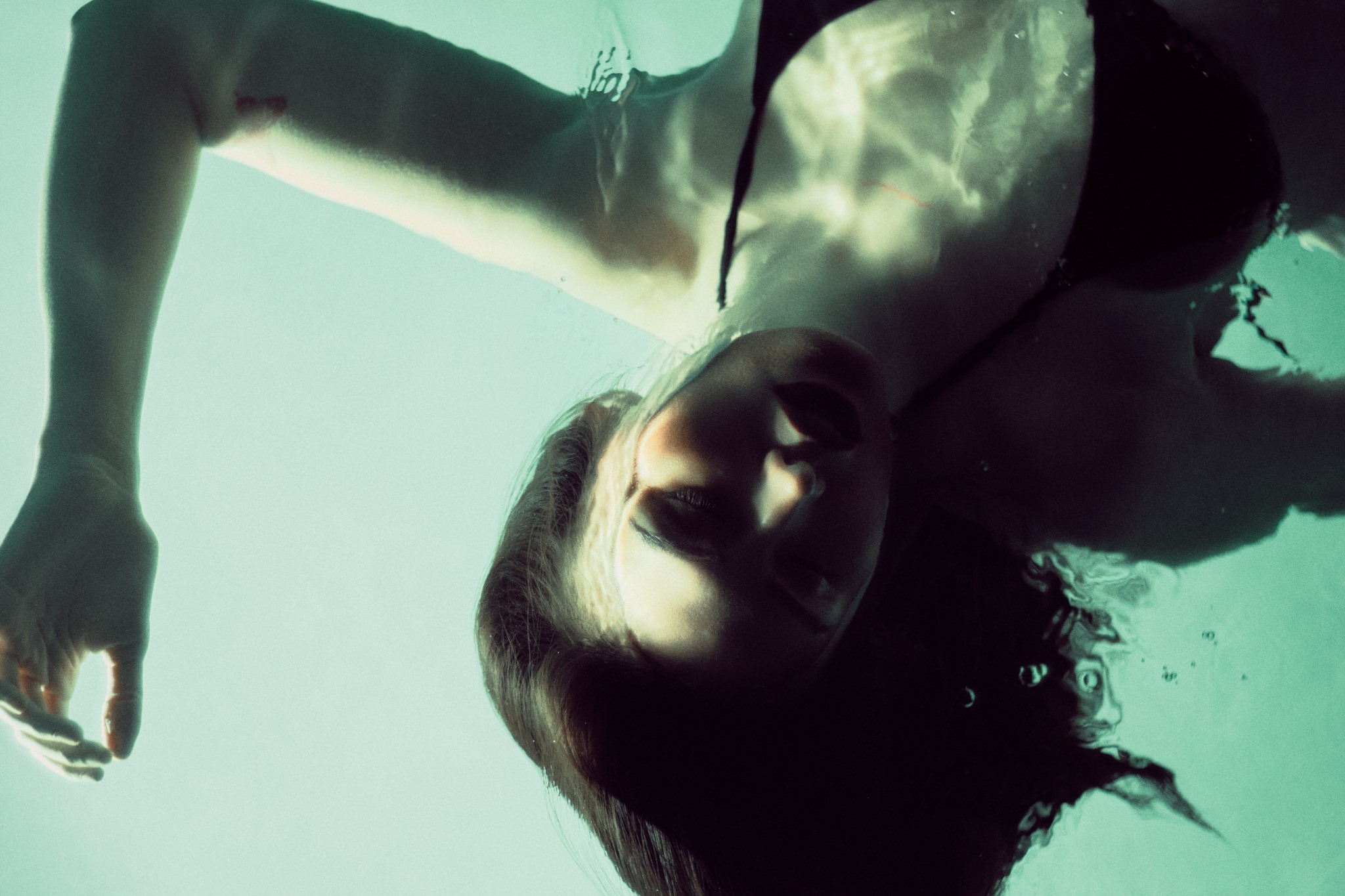 Underwater portrait in green light