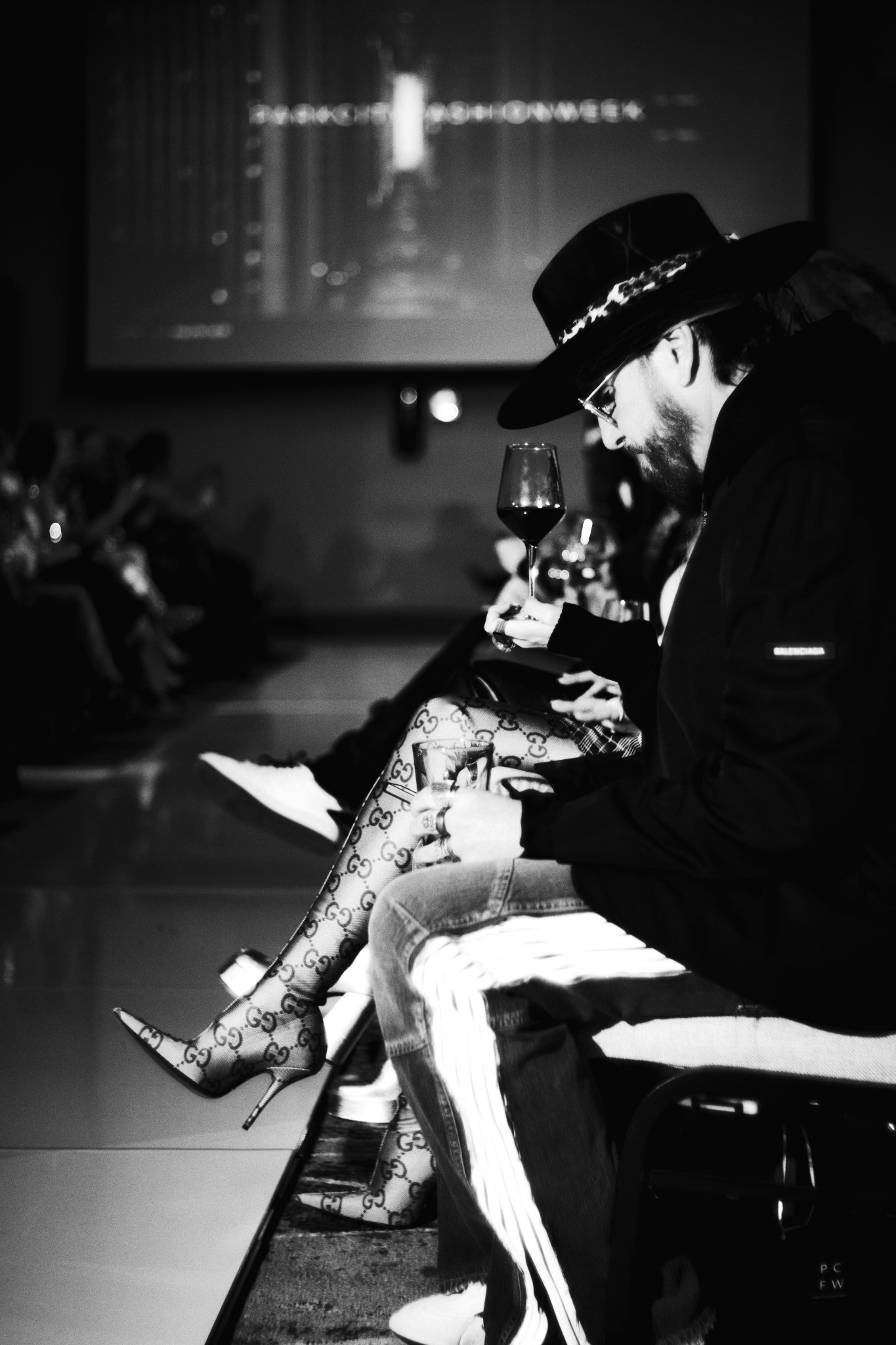 Runway audience and fashion detail
